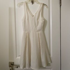 Cream color dress by The Impeccable pig